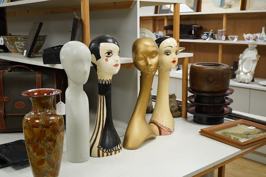 Two painted milliner’s hat display stands and two others, tallest 63cm high.